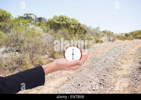 Immagine composita di close up di imprenditore con vuoto aperto a mano Foto Stock