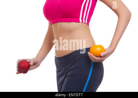 Donna che mantiene un apple e Orange Foto Stock
