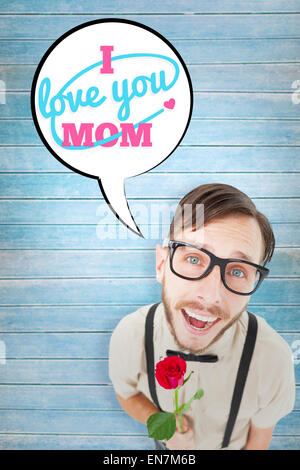 Immagine composita di geeky lovesick hipster holding rose Foto Stock