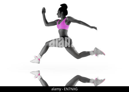 Immagine composita di montare brunette correre e saltare Foto Stock