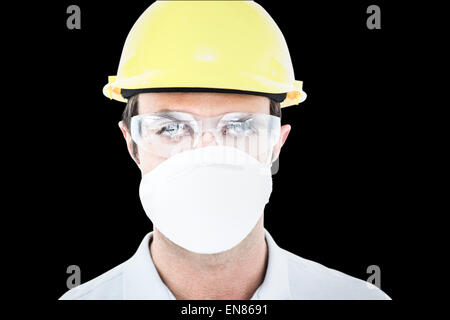 Immagine composita del Lavoratore che indossa la maschera protettiva e occhiali di protezione Foto Stock