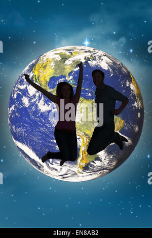 Immagine composita di allegro coppia giovane jumping Foto Stock