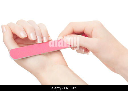 Donna mani manicure con lima per unghie Foto Stock