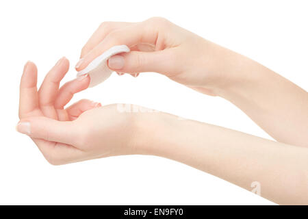 Donna mano e smalto per unghie remover, acetone Foto Stock