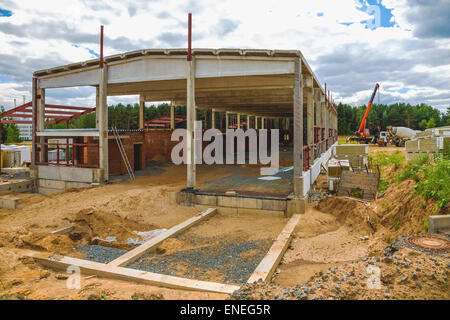 Edificio in costruzione sul sito di costruzione Foto Stock