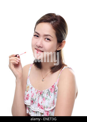 Donne Asian sorridenti con labbra gloss isolati su sfondo bianco. Bella fresca giovani asiatici modello femminile. Foto Stock