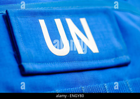 Nazioni Unite onu badge su un blu giubbotto antiproiettile Foto Stock