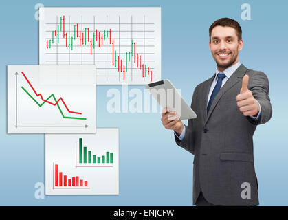 Buisnessman sorridente con tablet pc computer Foto Stock