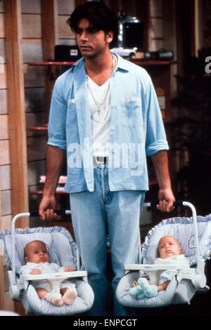 Full House, sitcom, STATI UNITI D'AMERICA 1987 - 1995, Staffel 5, Darsteller: John Stamos mit Zwillingen Foto Stock