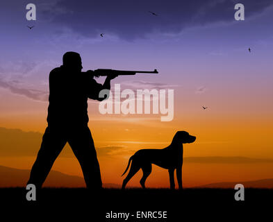 Illustrazione del cacciatore e hound sagome su sfondo al tramonto Foto Stock