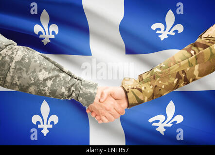 Soldati e handshake provincia canadese bandiera - Québec Foto Stock