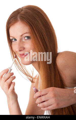 Per la cura del corpo - serie sorridente capelli rossi donna rossetto Foto Stock