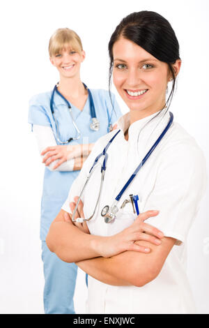 Il team medico di giovane medico infermiere sorridente femmina Foto Stock