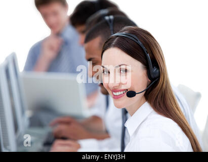 Business di successo team che lavora in un call center contro uno sfondo bianco Foto Stock