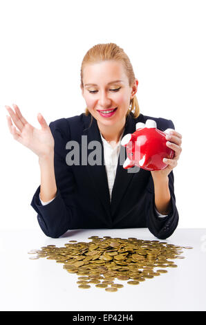 La donna la rottura salvadanaio per il risparmio Foto Stock