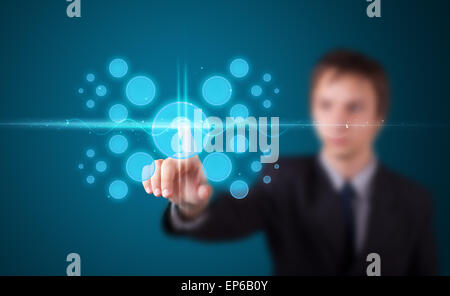 Imprenditore premendo high tech tipo di pulsanti moderno Foto Stock