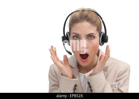 Sorpreso agente del call center con le mani alzate Foto Stock