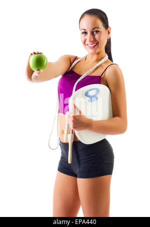 Giovane donna sportivo con Apple e scale isolate Foto Stock