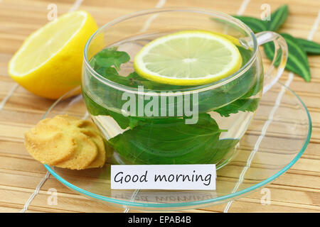 Buona mattina card con tazza di tè alla menta e limone Foto Stock