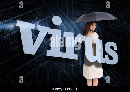 Imprenditrice azienda ombrello dietro il virus word Foto Stock