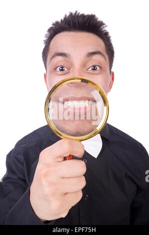 Funny Man con lente di ingrandimento Foto Stock