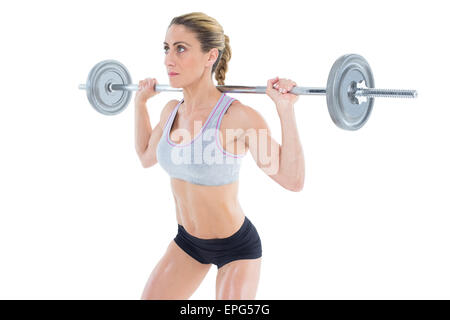 Femmina forte sollevamento crossfitter barbell dietro la testa Foto Stock