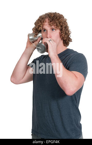 L'uomo usando stagno può telefono Foto Stock