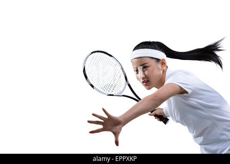 Femmina di giocatore di tennis pronto a colpire la sfera, ritratto Foto Stock