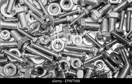 Shining bulloni e dadi, dello sfondo della foto con il fuoco selettivo Foto Stock