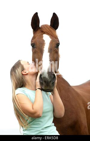 Donna con Hessian warmblood Foto Stock