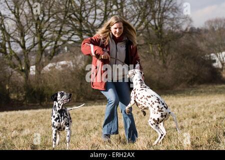 Giocare con il cane Foto Stock