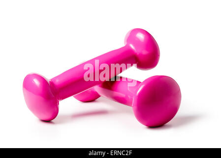 Una coppia di peso leggero manubri su sfondo bianco Foto Stock