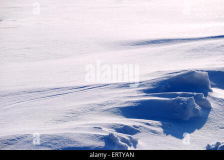 Lo sfondo da neve splenduto con Sun Foto Stock