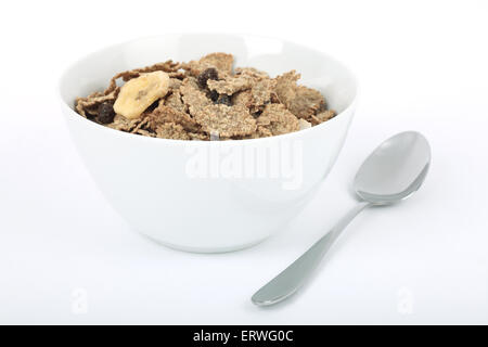 Una coppa di frutta e cereali in fibra Foto Stock