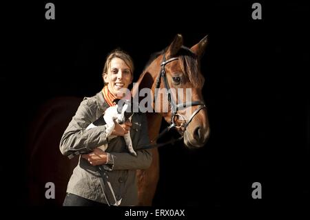 donna con pony Foto Stock