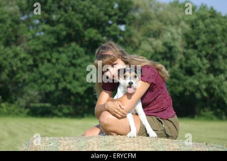 Donna e Parson Russell Terrier Foto Stock