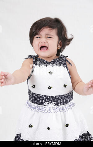 Quindici mesi ragazza bambino piangere signor#743S Foto Stock