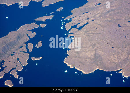 aereo di terra e di mare dalla finestra dell'aeromobile, Foto Stock