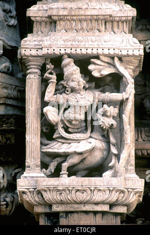 Lord Manmatha scultura in legno statua in vecchio tempio carro a Madurai ; Tamil Nadu ; India , asia Foto Stock