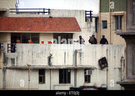 Guardia di sicurezza Nazionale Cmando, Nariman House, 2008 attacco di Mumbai, attacco terroristico, attacco terroristico, Bombay, Mumbai, Maharashtra, India, 26th Nov 2008 Foto Stock