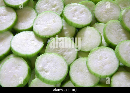 Vegetali verdi ; fettine rotonde di ghiya nanuan pompion superriduttore tipo di zucca Foto Stock
