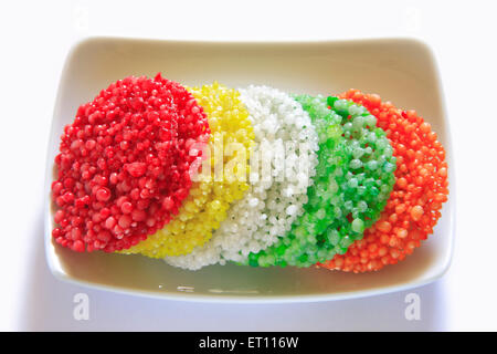 Sabudana papad poppadom sago cycas circinalis metroxylon sagu su sfondo bianco Foto Stock