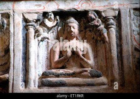 Rilievo scolpito di Buddha alle grotte di Ajanta Aurangabad Maharashtra India arte indiana asia scultura di buddha asiatico Foto Stock