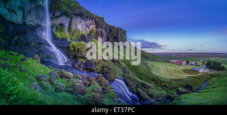 Potabile fresca cascata, Fagrifoss cascata, Islanda Foto Stock