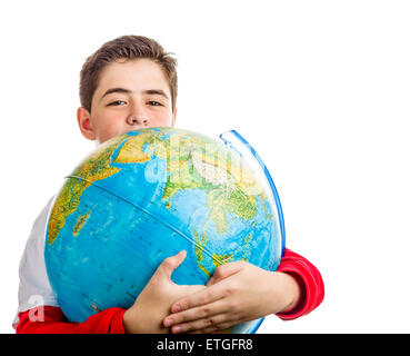 Un ragazzo caucasico abbracci un globo rivelando solo gli occhi e parte del viso Foto Stock