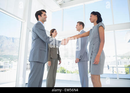 Riunioni di team aziendali i loro partner Foto Stock