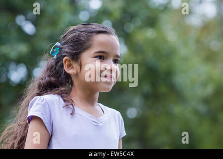 Poco ragazza sorridente Foto Stock