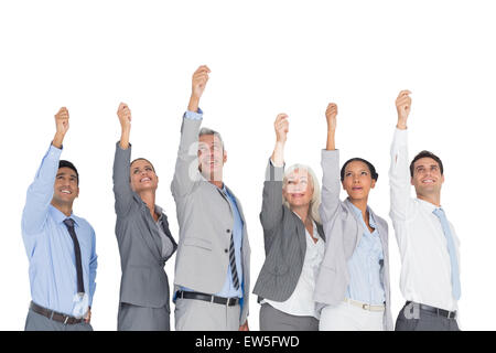 La gente di affari alzando le braccia Foto Stock