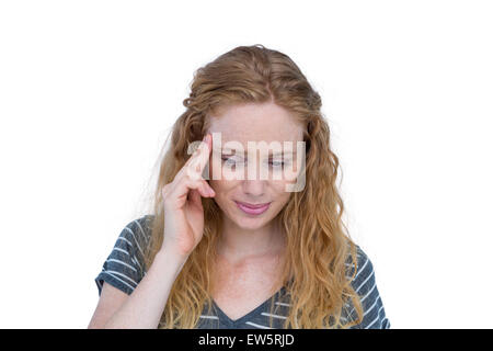 Una donna bionda avente mal di testa Foto Stock