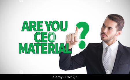 Immagine composita di pensosa imprenditore puntando qualcosa con il suo dito Foto Stock